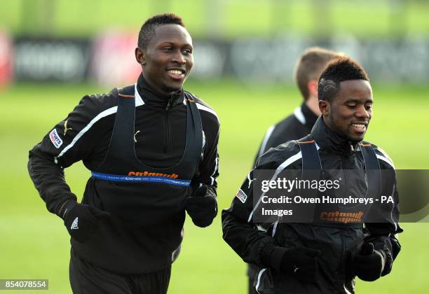 Newcastle United's Mapou Yanga-Mbiwa and Gael Bigirimana during a training session at Longbenton, Newcastle.