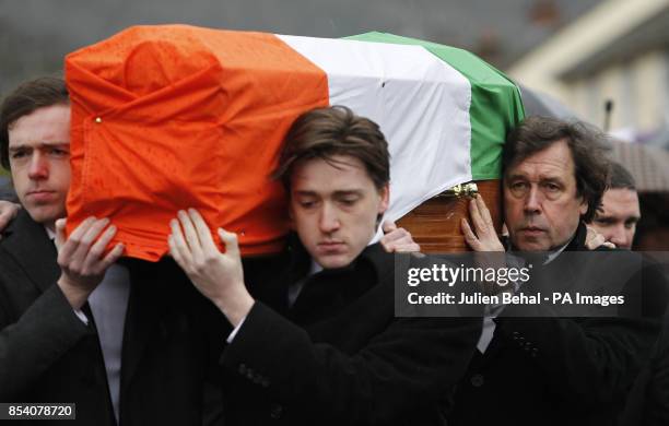 Dolours Price's coffin is carried from her family home Slievegallion Drive in Andersontown West Belfast by her two sons Danny and Oscar at front and...