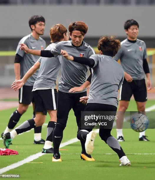 Players of Urawa Red Diamonds attend a training session ahead of 2017 AFC Champions League semifinal first leg match between Shanghai SIPG and Urawa...