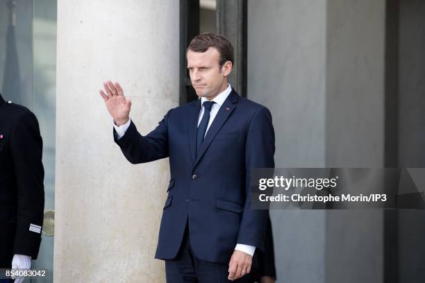 French President Emmanuel Macron greets President of the European Parliament Antonio Tajani after a meeting at the Elysee Palace on September 22,...