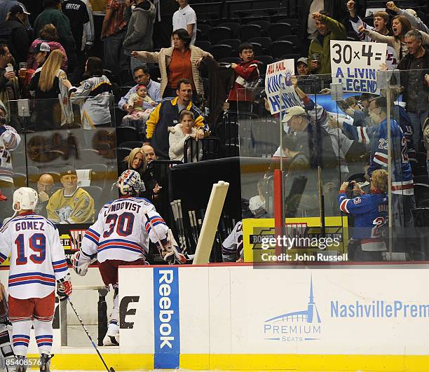 Henrik Lundqvist of the New York Rangers is cheered by fans after defeating the Nashville Predators on March 12, 2009 at the Sommet Center in...