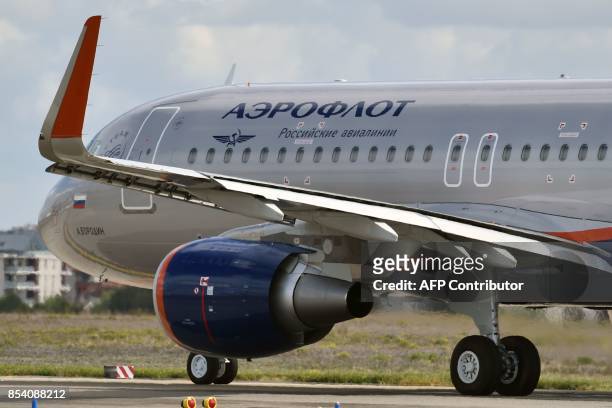 An Airbus A320 belonging to the Russian company Aeroflot prepares to take off on September 26, 2017 from Toulouse-Blagnac airport in southwestern...