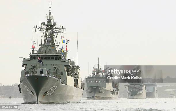 Ships are seen in Sydney Harbour after entering through the Sydney heads during a ceremonial exercise involving The Royal Australian Navy's Fleet...