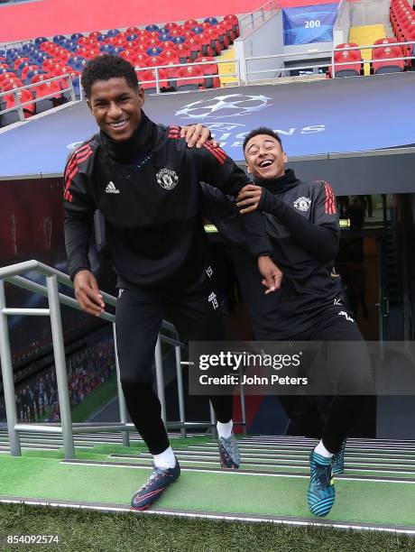 Marcus Rashford and Jesse Lingard of Manchester United walk out ahead of a training session ahead of their UEFA Champions League match against CSKA...