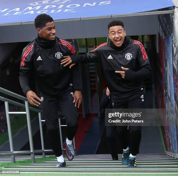 Marcus Rashford and Jesse Lingard of Manchester United walk out ahead of a training session ahead of their UEFA Champions League match against CSKA...