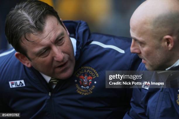 Blackpool caretaker manager Steve Thompson with coach Alan Wright on the bench