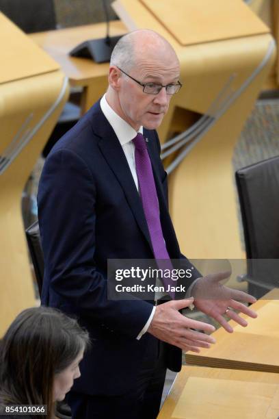 Scotland's Deputy First Minister John Swinney updates the Scottish Parliament on talks held in London this week between the Scottish Government and...