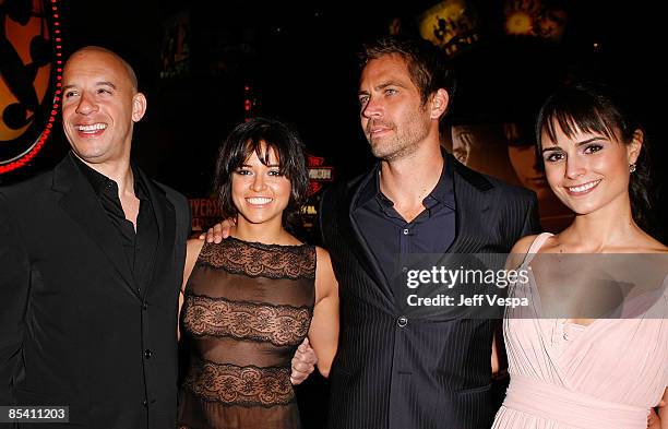 Actors Vin Diesel, Michelle Rodriguez, Paul Walker and Jordana Brewster arrive on the red carpet of the Los Angeles premiere of "Fast & Furious" held...