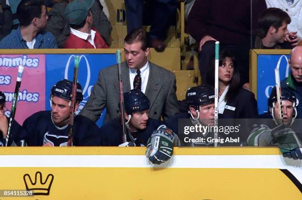 Head coach Paul Maurice of the Hartford Whalers watches from the bench against the Toronto Maple Leafs during NHL game action on November 24, 1995 at...