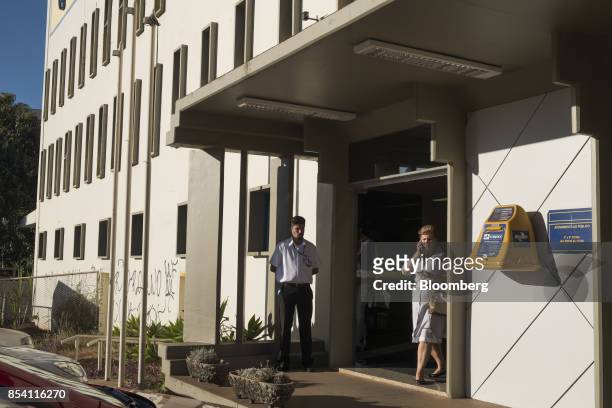 Customer exits a post office in Brasilia, Brazil, on Tuesday, Sept. 12, 2017. President Michel Temer is unwinding it all as he moves to scale down a...
