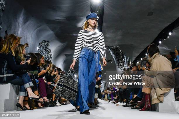 Sasha Pivovarova walks the runway during the Christian Dior show as part of the Paris Fashion Week Womenswear Spring/Summer 2018 on September 26,...