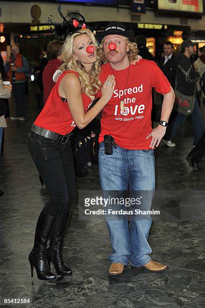 Caprice Valerie Bourret and Leigh Francis attend a photocall to raise money for Comic Relief at Euston Station on March 13, 2009 in London, England.