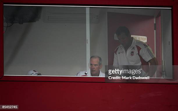 Wayne Bennett coach of the Dragons sits in the coaches box during the round one NRL match between the Melbourne Storm and the St George Illawarra...