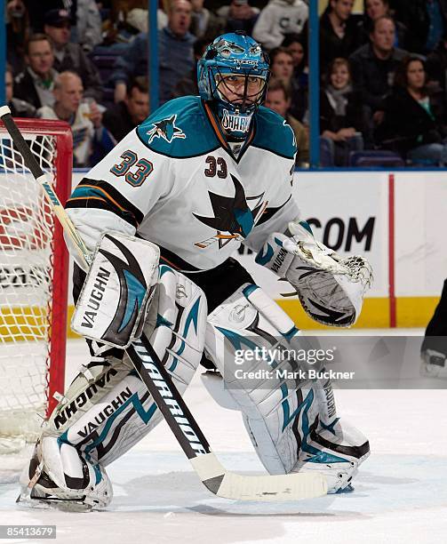 Brian Boucher of the San Jose Sharks wathes the actin against the St. Louis Blues on March 12, 2009 at Scottrade Center in St. Louis, Missouri.