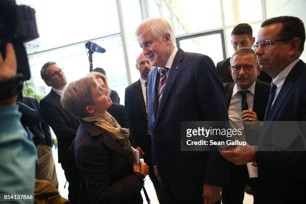 Bavarian Governor and leader of the Bavarian Christian Democrats Horst Seehofer speaks to the media following a meeting of the CSU and German...