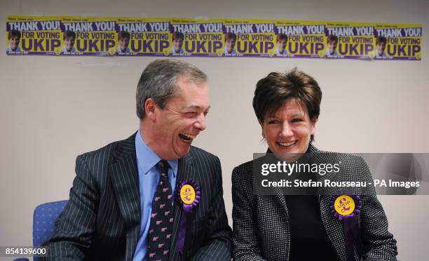 Leader Nigel Farage congratulates their candidate Diane James on coming second in the Eastleigh by-election after holding a news conference in the...