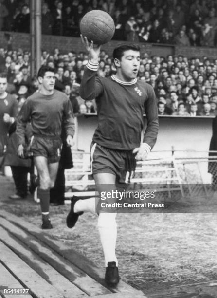 Chelsea captain Terry Venables leads his team out before a match, March 1965.
