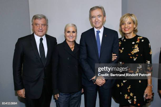 Dior Sidney Toledano, Stylist Maria Grazia Chiuri, Owner of LVMH Luxury Group Bernard Arnault and his wife Helene Mercier-Arnault pose backstage...