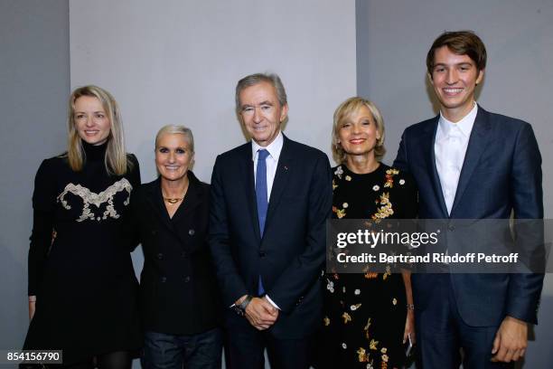 Louis Vuitton's executive vice president Delphine Arnault, Stylist Maria Grazia Chiuri, Owner of LVMH Luxury Group Bernard Arnault, his wife Helene...