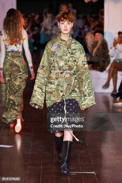 Model saunters down the runway in Natasha Zinko's SS18 collection on Sept 15th 2017 at 180 Strand in London, UK.