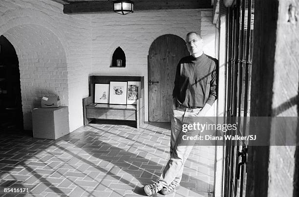 And chairman of Apple, Steve Jobs in the hallway of his Palo Alto home for Time Magazine December 7, 2004.