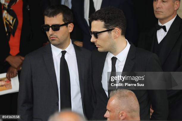 Nicolas and Jean Victor Meyers attend Liliane Bettencourt's funeral at Eglise Saint Pierre on September 26, 2017 in Neuilly-sur-Seine, France.