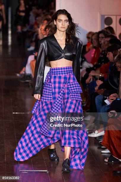 Model saunters down the runway in Natasha Zinko's SS18 collection on Sept 15th 2017 at 180 Strand in London, UK.