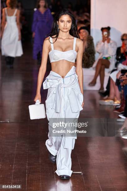 Model saunters down the runway in Natasha Zinko's SS18 collection on Sept 15th 2017 at 180 Strand in London, UK.