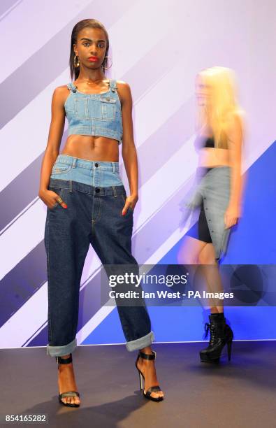 Models showcase Rihanna's new fashion line at the River Island store in Oxford Street, London, to promote her new fashion line.