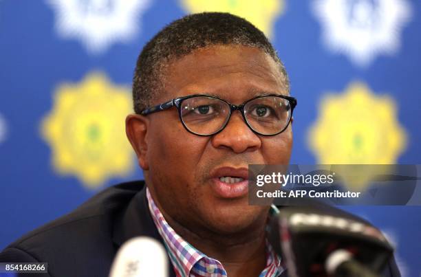 South African Police minister Fikile Mbalula gives a press briefing on September 26, 2017 in Johannesburg, South Africa, after a group of 36 elderly...