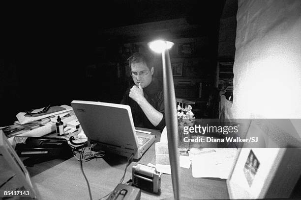 Apple Computer CEO Steve Jobs working on his Macworld Expo speech announcing Apple alliance w. Microsoft in his home office in Palo Alto, CA on...