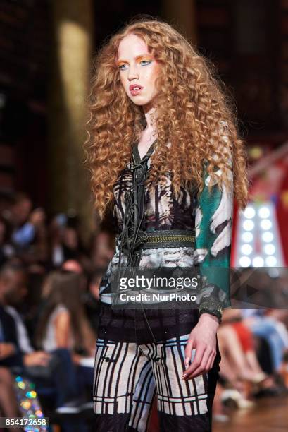 Model saunters down the runway wearing Kristian Aadvenik's SS18 collection Sept 15th 2017 at number 1 Horse Guards Parade in London, UK
