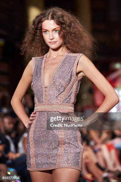 Model saunters down the runway wearing Kristian Aadvenik's SS18 collection Sept 15th 2017 at number 1 Horse Guards Parade in London, UK