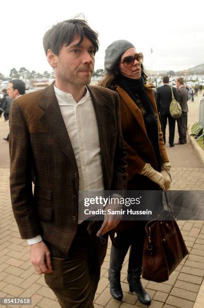 Alex James of Blur and wife Claire Neate James attend Gold Cup day at the Cheltenham Festival on March 13, 2009 in Cheltenham, England.