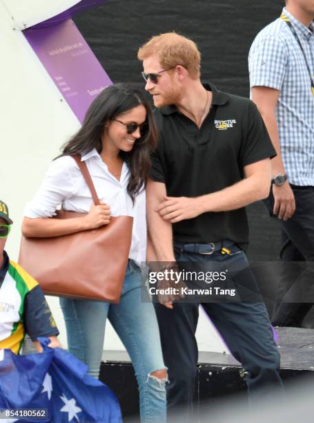 Meghan Markle and Prince Harry attend the Wheelchair Tennis on day 3 of the Invictus Games Toronto 2017 at Nathan Philips Square on September 25,...