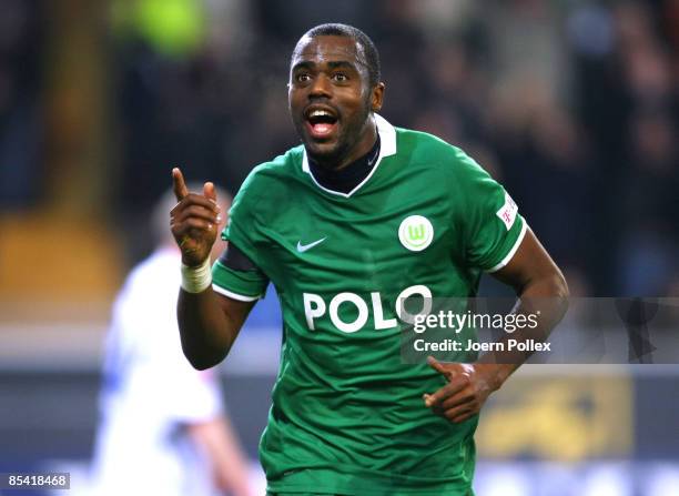 Grafite of Wolfsburg celebrates after scoring his team's fourth goal during the Bundesliga match between VfL Wolfsburg and FC Schalke 04 at the...