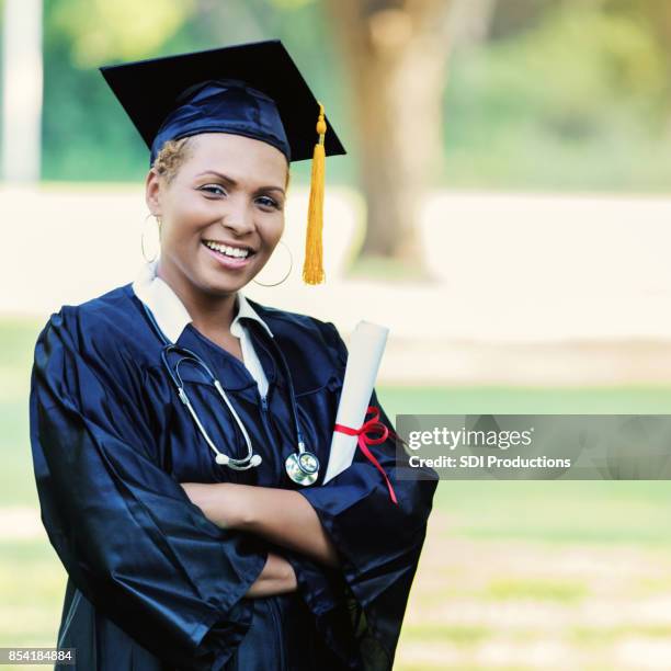 medical school graduate - medical school graduation stock pictures, royalty-free photos & images