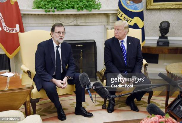 President Donald Trump meets with Prime Minister Mariano Rajoy of Spain in the Oval Office of The White House September 26, 2017 in Washington, DC.