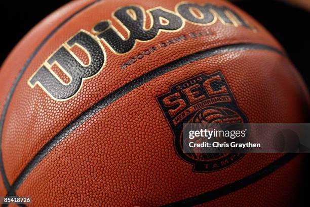 Referee holds a basketball during the game between the Kentucky Wildcats and the Louisiana State University Tigers during the second round of the SEC...