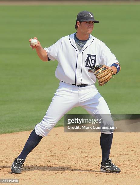 Cale Iorg of the Detroit Tigers fields against the New York Mets during the spring training game at Joker Marchant Stadium on March 13, 2009 in...