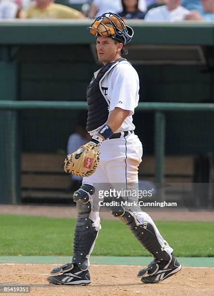 Matt Treanor of the Detroit Tigers looks on against the New York Mets during the spring training game at Joker Marchant Stadium on March 13, 2009 in...