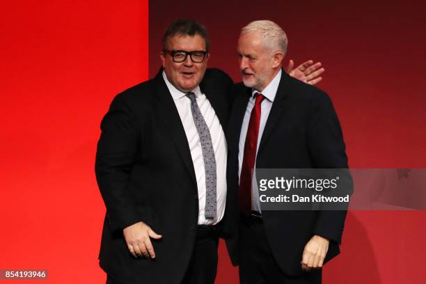 Deputy Labour party leader Tom Watson is congratulated by Labour party leader Jeremy Corbyn after delivering a speech to delegates in the main hall,...