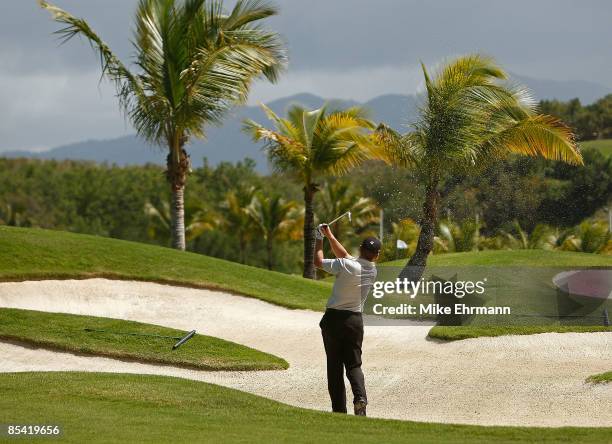 Michael Bradley hits a fairway bunker shot on the 5th hole during the second round of the 2009 Puerto Rico Open presented by Banco Popular on March...