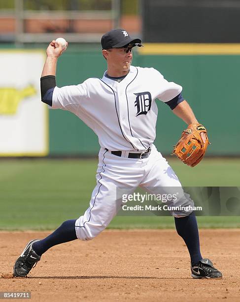 Brandon Inge of the Detroit Tigers throws against the New York Mets during the spring training game at Joker Marchant Stadium on March 13, 2009 in...