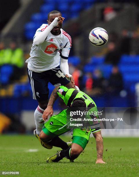 Bolton Wanderers' Medo Kamara is tackled by Brighton and Hove Albion's Liam Bridcutt during the npower Football League Championship match at The...