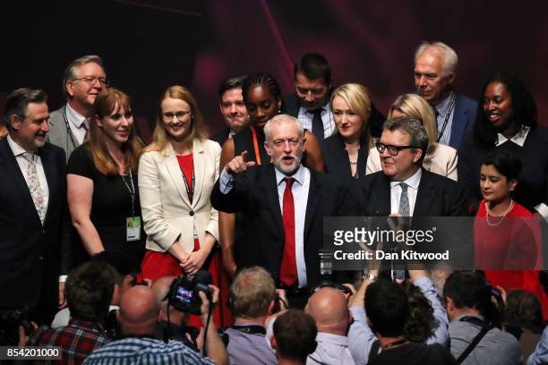 Labour party leader Jeremy Corbyn gestures as Shadow Secretary of State for International Trade Barry Gardiner , Shadow Secretary of State for...