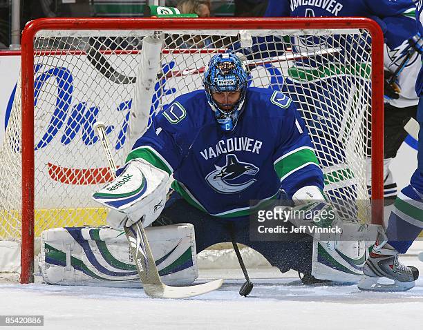 Roberto Luongo of the Vancouver Canucks makes a save during the game against the Tampa Bay Lightning at General Motors Place on February 27, 2009 in...