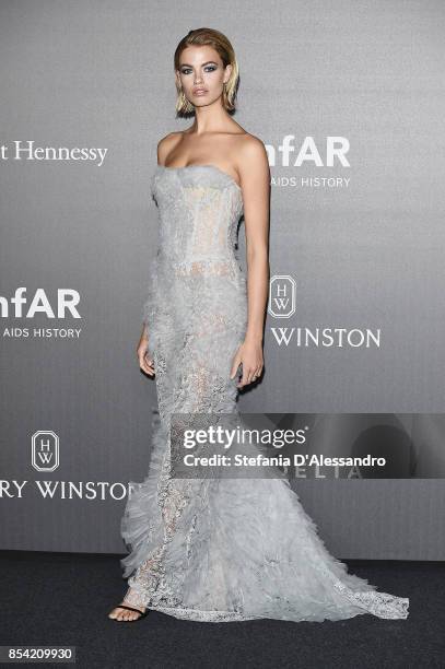 Hailey Clauson walks the red carpet of amfAR Gala Milano on September 21, 2017 in Milan, Italy.