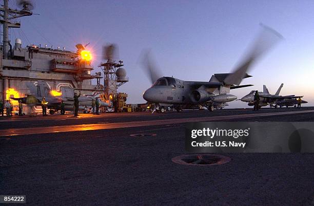 Navy S-38 "Viking" launches from the flight deck of the USS Kitty Hawk November 5, 2001 during support missions in support of Operation Enduring...