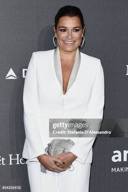 Alena Seredova walks the red carpet of amfAR Gala Milano on September 21, 2017 in Milan, Italy.